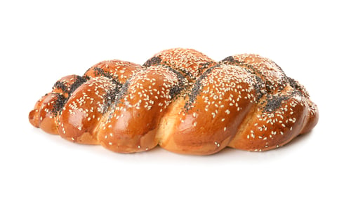 Preview: Sweet plaited challah on white background. Fresh bread