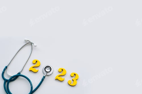 Preview: Stethoscope and numbers 2023.happy new year 2023.White background.copy space.Happy New Year medical.