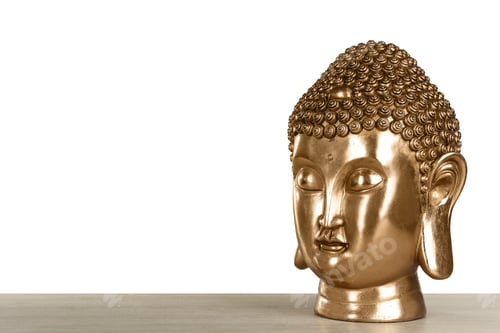 Preview: Beautiful golden Buddha sculpture on wooden table against grey background. Space for text