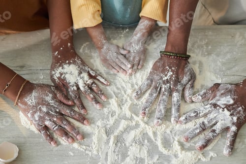 Preview: Family of three baking together at home