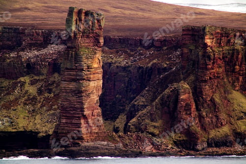 Preview: Beautiful view of the ancient Old Man of Hoy and the sea in Orkney, Scotland