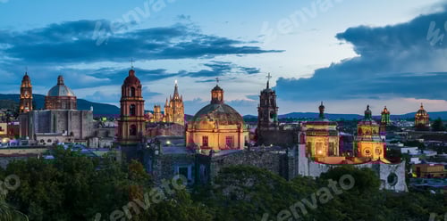 Preview: Panoramic view of church domes of San Miguel de Allende, Mexico in twilight
