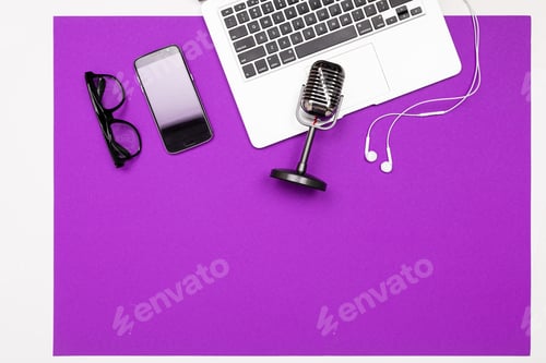 Preview: School and office supplies lie neatly on a purple background