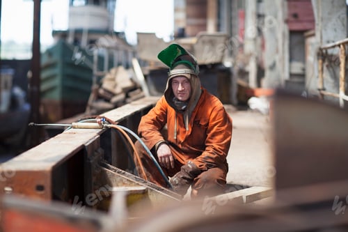 Preview: Portrait of welder in shipyard workshop