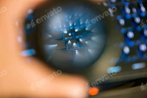 Preview: Close up keyboard view through to distracted lens