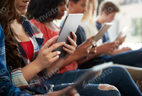 Preview: Close Up Of A Line Of High School Students Using Digital Tablets