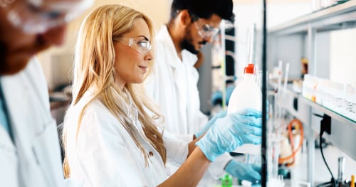 Preview: Young students of chemistry working in laboratory