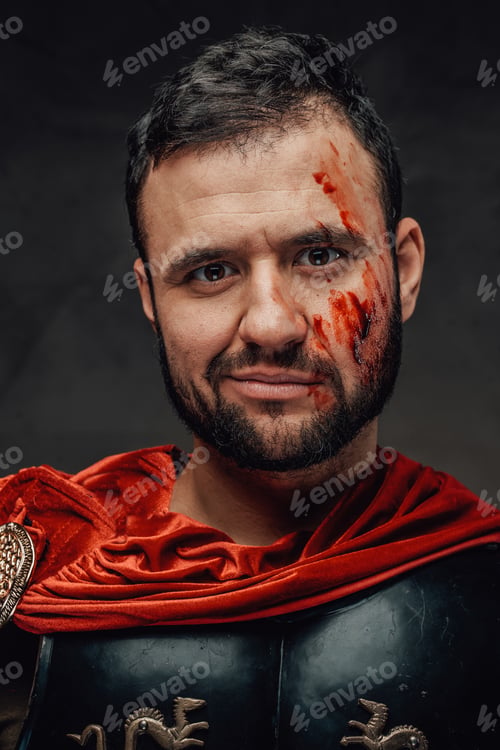 Preview: Smiley roman warrior looking at camera in dark background
