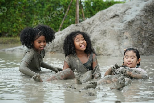 Preview: Group of happy children playing at playground