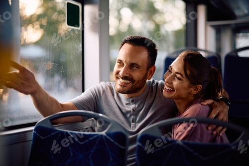 Preview: Happy couple in love riding in a bus.