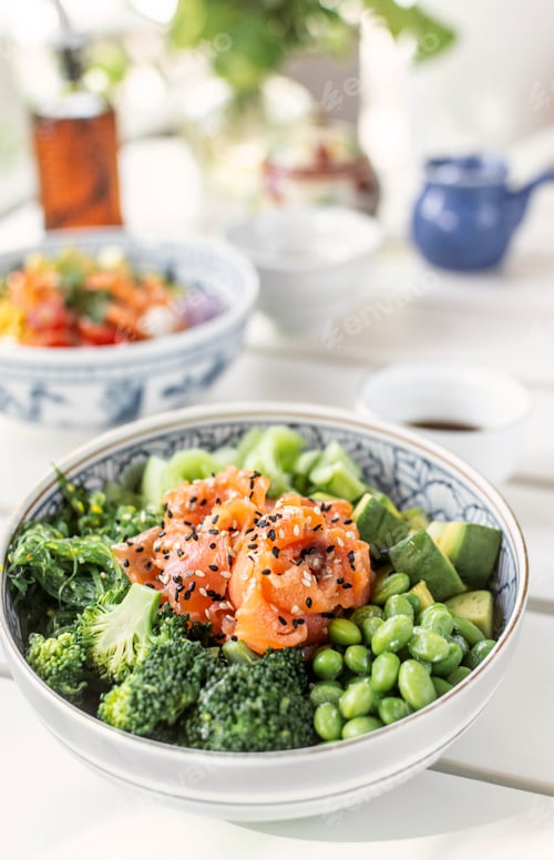 Preview: smoked salmon and green vegetable healthy poke bowl on white table in melbourne australia cafe