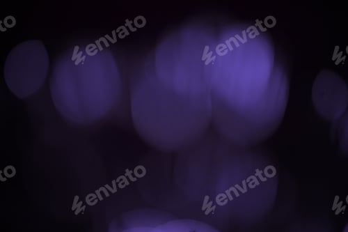 Preview: Blurred violet light splash, bokeh effect background.