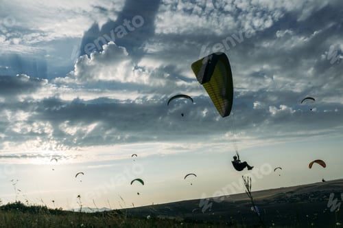 Preview: Mountainous landscape with paratroopers flying in the sky, Crimea, Ukraine, May 2013