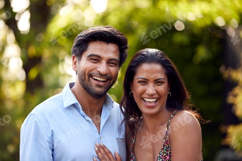 Vista previa: Portrait Of Loving Couple Outdoors In Garden Or Countryside