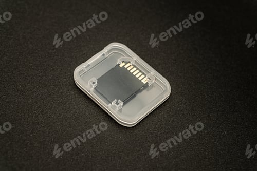 Preview: SD card box isolated on a black background