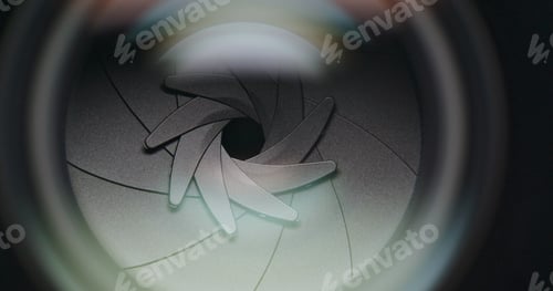 Preview: Closeup shot of professional camera lens, adjusting aperture