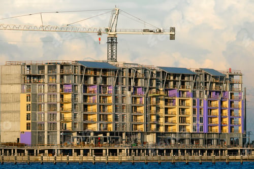 Preview: Tower cranes and frame structure of high residential apartment buildings at construction
