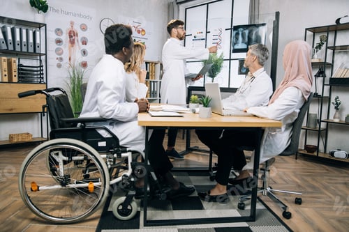 Preview: Medical workers discussing gene modification at office