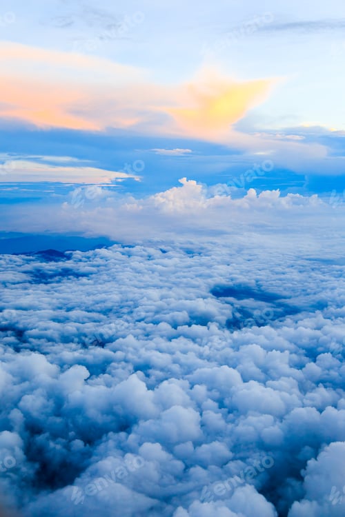 Preview: blue sky with the clouds from the plane view