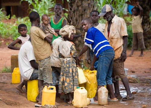 Preview: Village life Locals gather around for water collection.