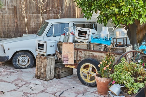 Preview: Old car, wheelbarrow with antique utensils made of wood and metal, to decorate