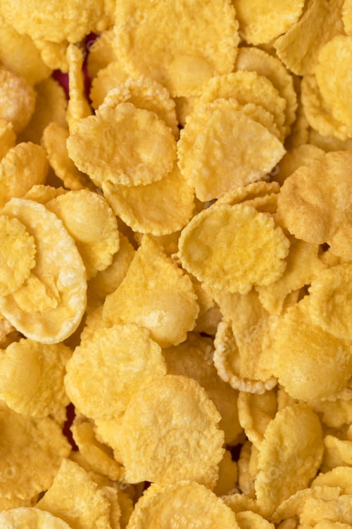 Preview: close-up full frame background from healthy crispy corn flakes