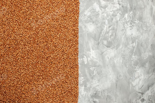 Preview: Top view (buckwheat) vertical on white table wiht free place for text