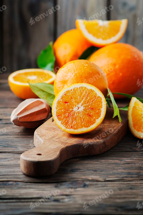 Preview: Fresh sweet oranges on the wooden table