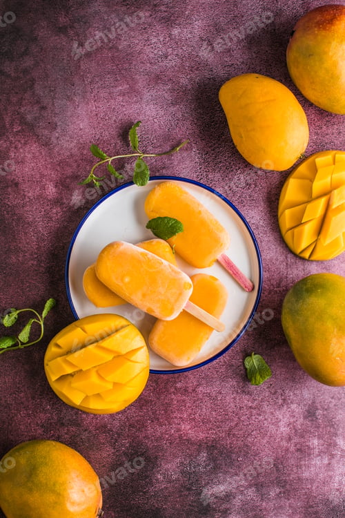 Preview: Mango banana popsicles with fresh fruits, flat lay top view
