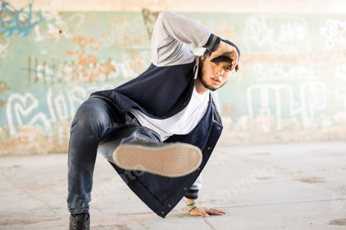 Preview: Young man breakdancing outdoors