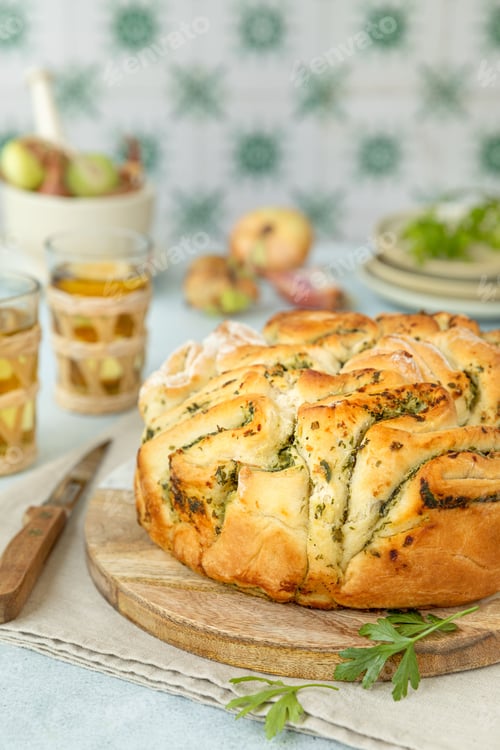 Preview: Freshly baked herb bread in a cozy kitchen setting.