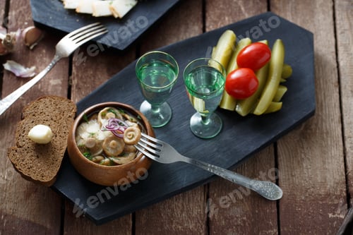 Vorschau: Russian style. Vodka with pickled mushrooms.