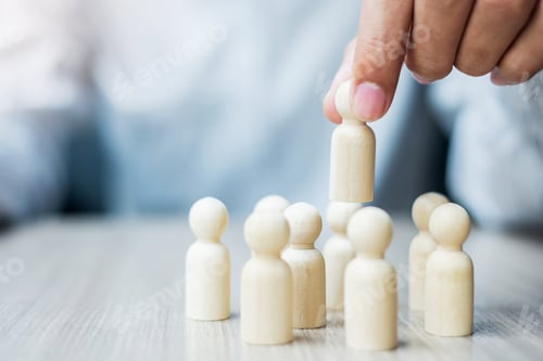 Preview: Businessman hand pulling leader man wooden from crowd of employees. People, Business, Human resource