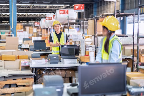 Preview: Worker working in the large depot storage warehouse concentrate check stock at cashier counter