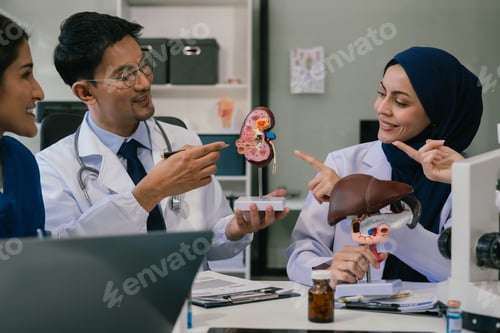 Preview: Medical, meeting and laptop for team in office in discussion, brainstorming and planning
