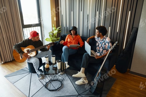 Preview: Band Working In Recording Studio