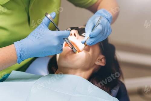 Preview: Woman Receiving Dental Treatment with Anesthetic Injection