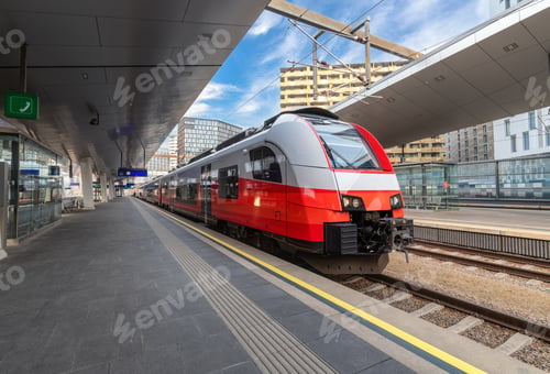 Preview: High speed train on the train station at sunset in Vienna