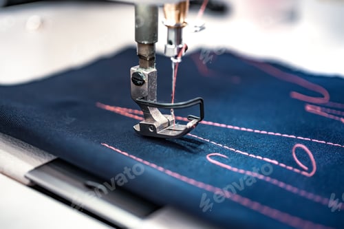 Preview: Professional sewing machine close-up. Modern textile industry.