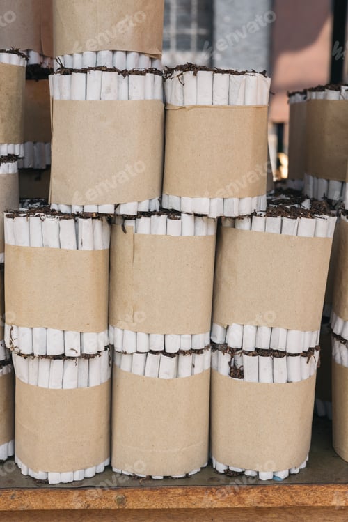 Preview: Stacks of handmade cigarette packs at a market stall in Belen, Iquitos Peru