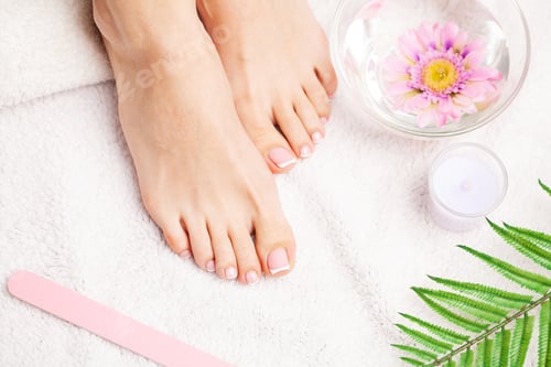 Preview: Close up of beautiful legs of a woman doing a pedicure
