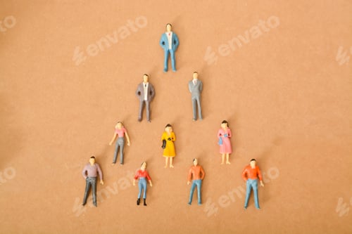 Preview: people forming a team in a pyramid shape, the idea of a hierarchical structure group or organization