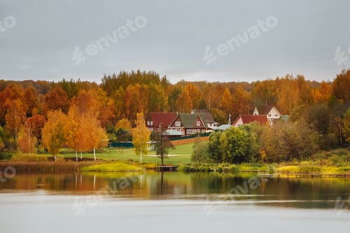 Preview: Cottages on the lake. Rural views of the beautiful homes in autumn.