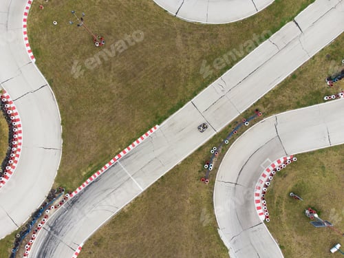 Preview: aerial view of the karting track during the race. Several racing karts compete on a special track.