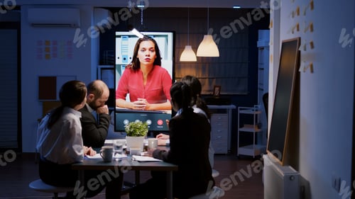 Preview: Workaholics multi-ethnic businesspeople discussing financial strategy during online videocall