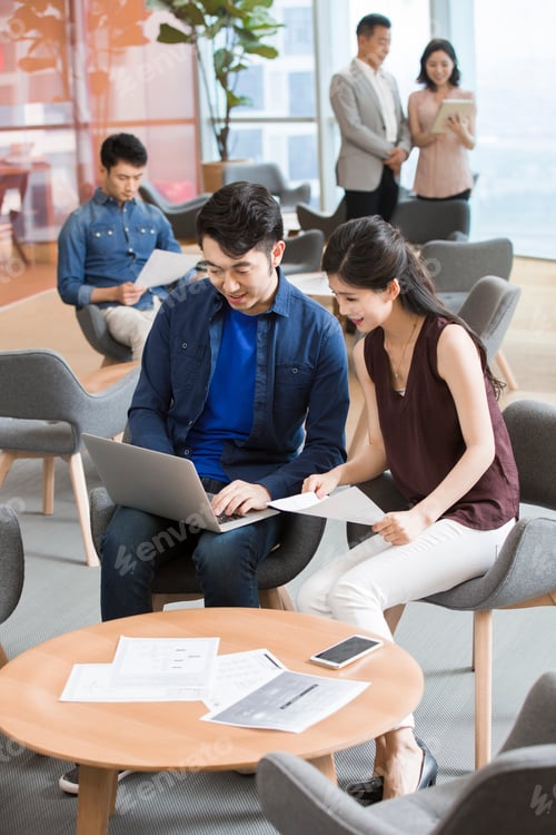 Preview: Business people working in office