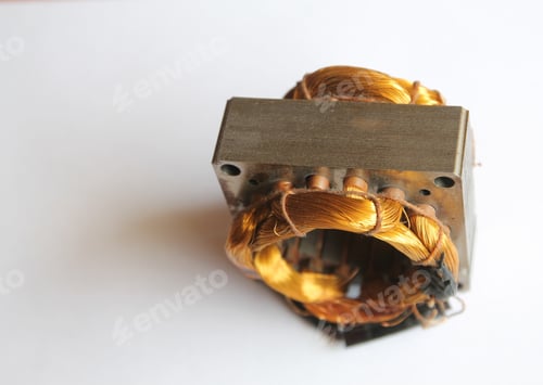 Preview: Closeup shot of an electrical machine stator with copper coil wiring isolated on a white background