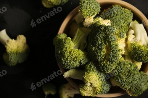 Preview: Fresh Broccoli Lying On A Black Background