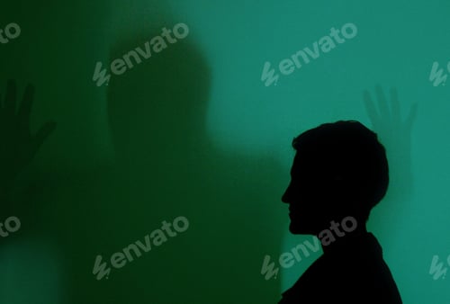 Preview: Silhouette of a woman with short hair on the ghost shadows wall background