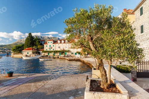 Preview: Cozy coastal town in Montenegro with traditional houses and sea view